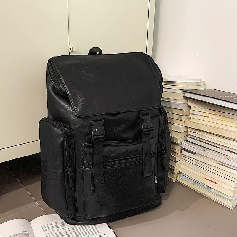 Czarny plecak SchoolKit w stylu retro z matowej eko-skóry z klamrami i kieszeniami na laptopa
